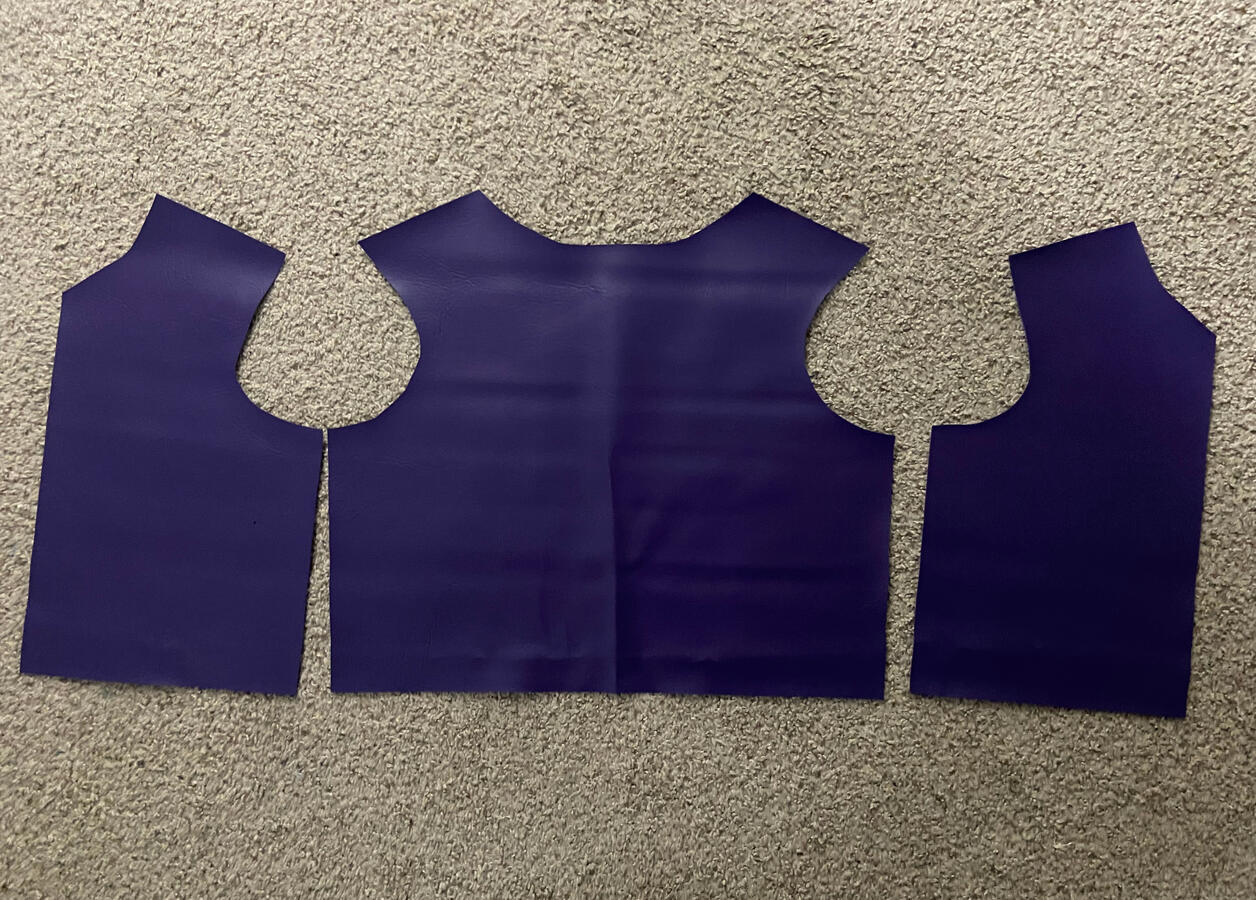 Faux leather pieces cut out