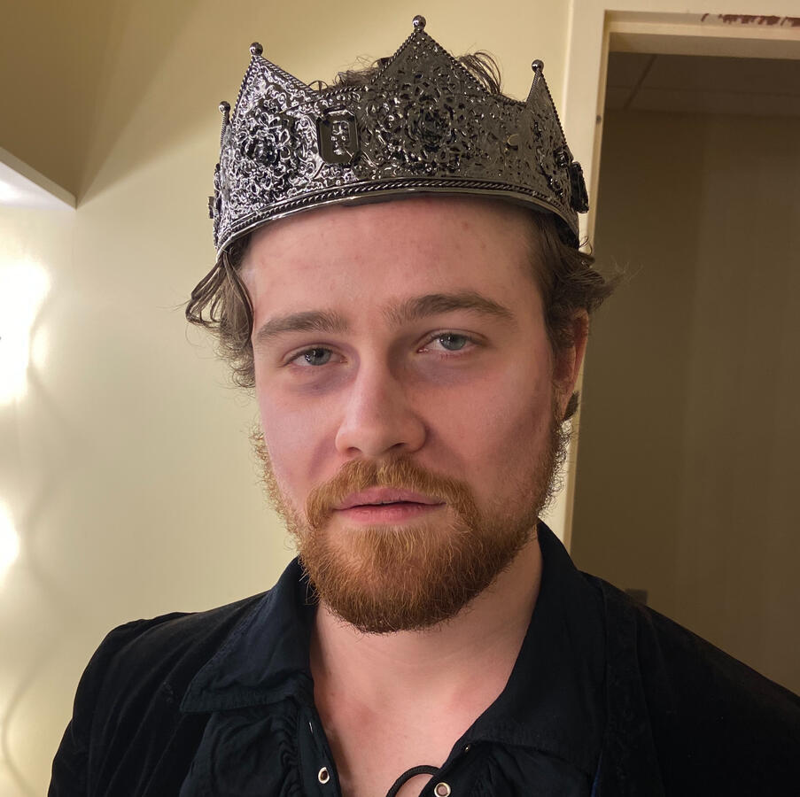 Derrick Bass as King Hamlet